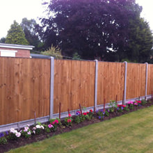 Concrete posts with Featheredge panels