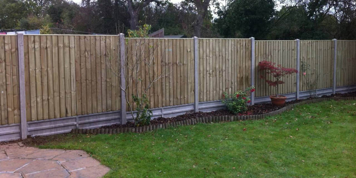Concrete posts with featheredge panels
