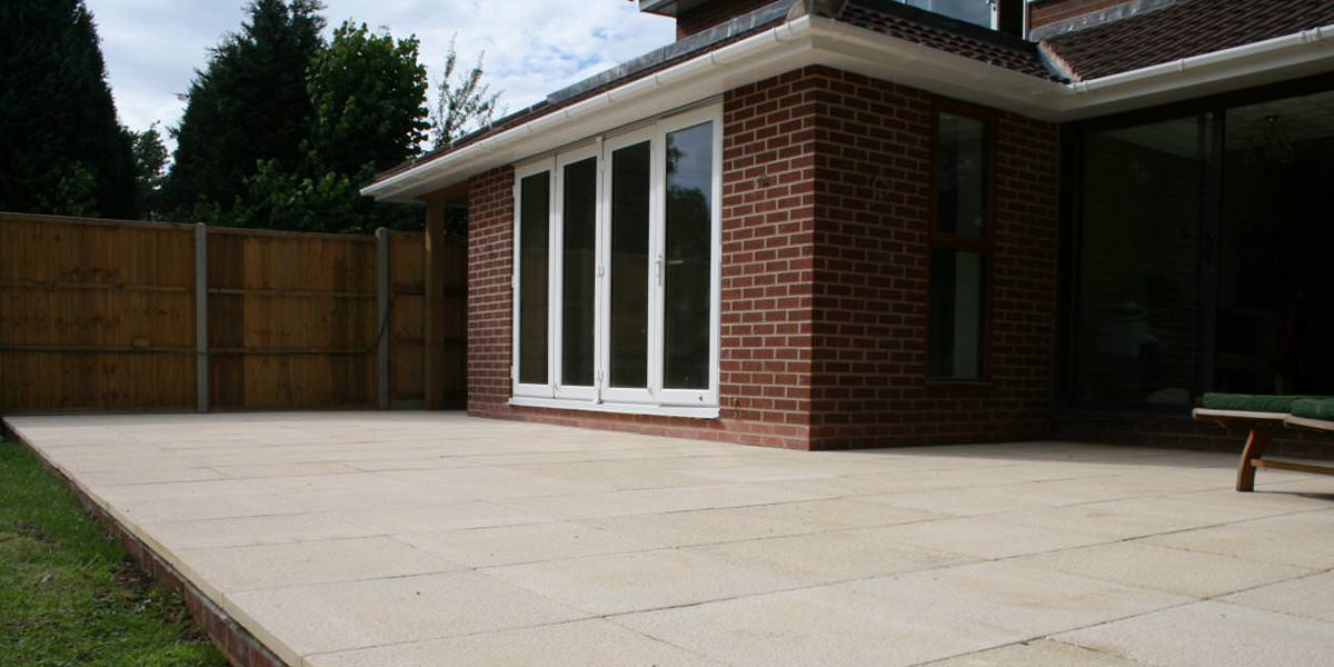 Home extension with paving